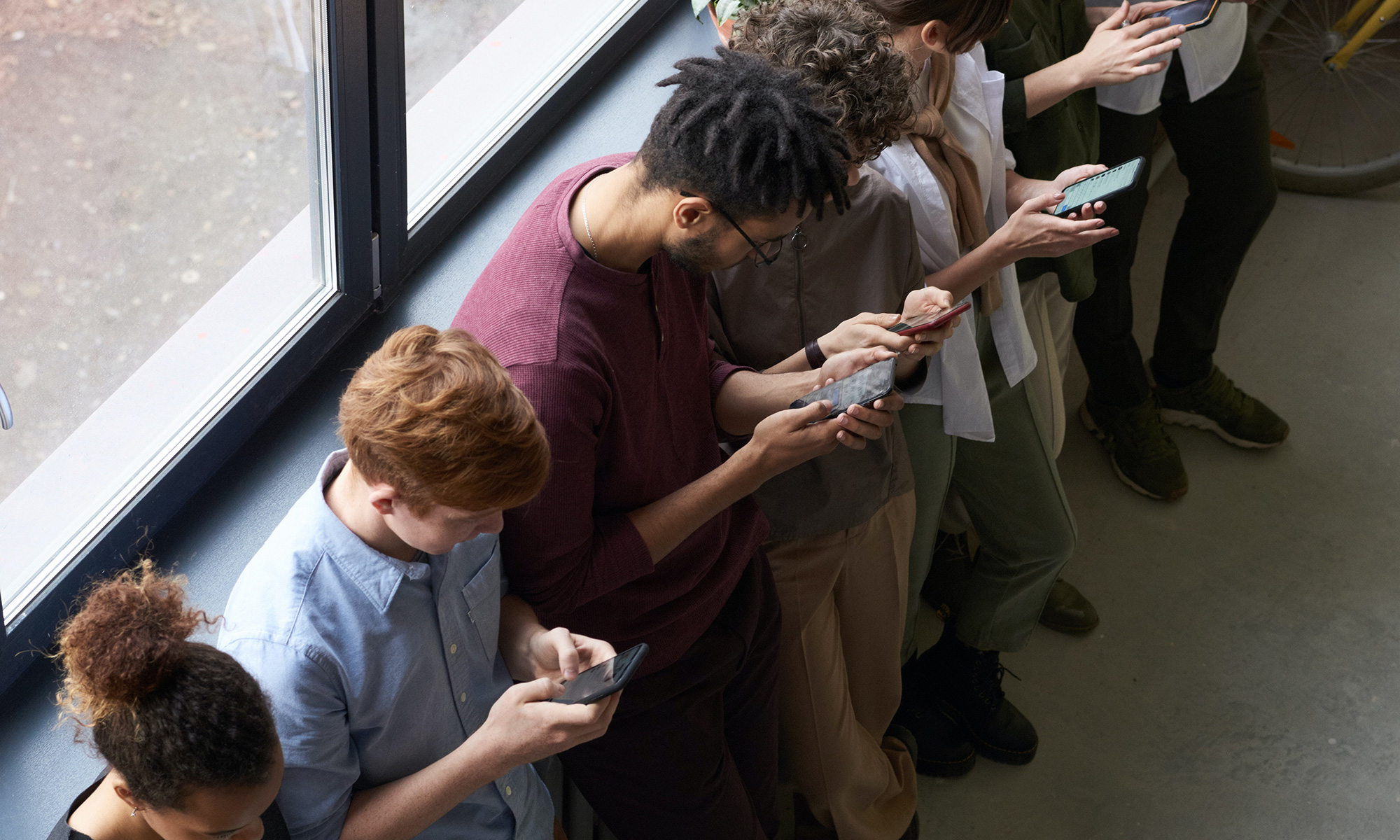 Smaller Social Apps People on their phones