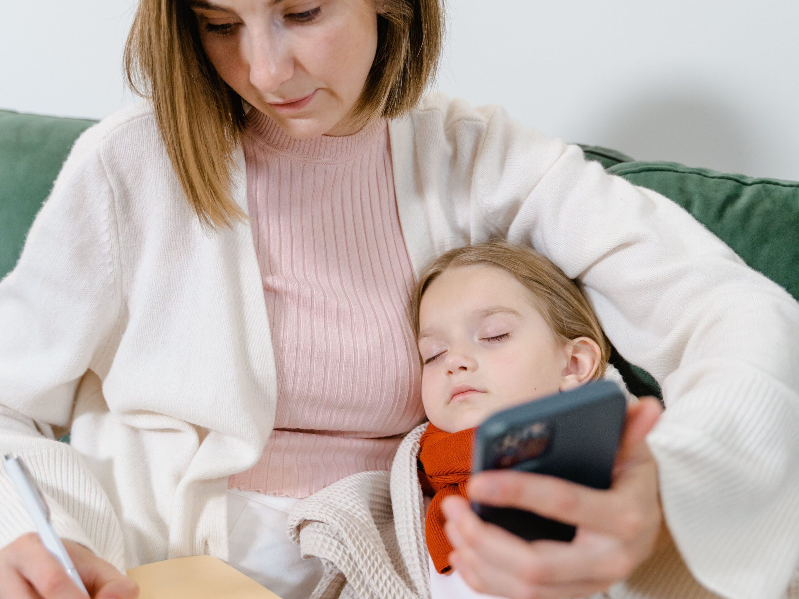 high speed internet Telehealth Healthcare Mother with sick child using Telehealth to contact her doctor